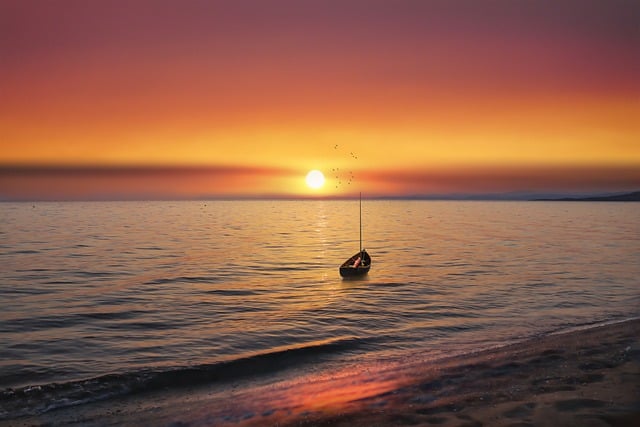 boat on the water at sunset