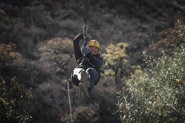 Smiling woman on a zip line