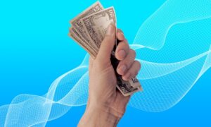 hand holding money