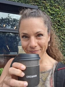 a woman sipping coffee