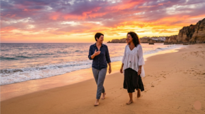 two women walking at the seashore